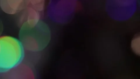 Moving matte bokeh and colored single lights Vidéo 317459506