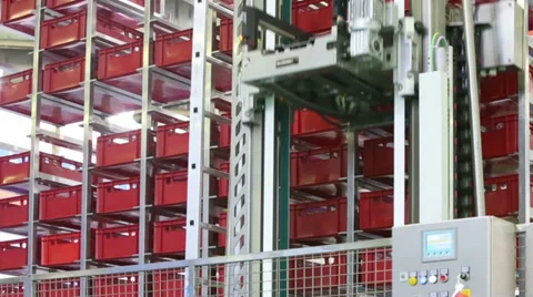 Moving mechanical lift for shifting boxes in large warehouse Video stock 38150262