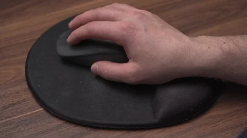Moving mouse on ergonomic mousepad, close up view Stock Footage 334673771