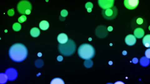 Moving multicolor particles background with bokeh seamless loop animation on  Stock Footage 219596904
