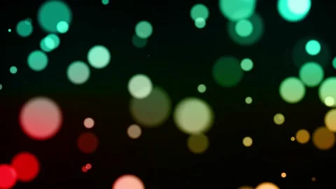 Moving multicolor particles background with bokeh seamless loop animation on  Stock Footage 219596906
