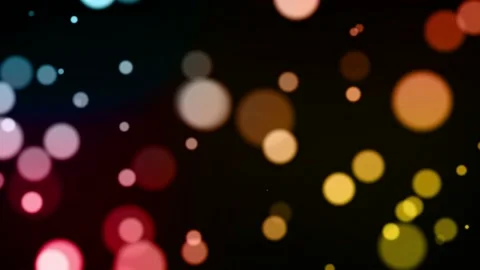 Moving multicolor particles background with bokeh seamless loop animation on  Stock Footage 219596976