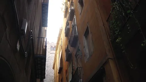 Moving In A Narrow Passage Between Old Residential Buildings In Spain Stock Footage 227718300