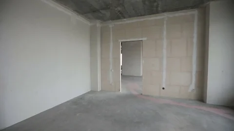 Moving in new home. Overview of empty room with bare walls, ceiling, floor Stock Footage 81219613