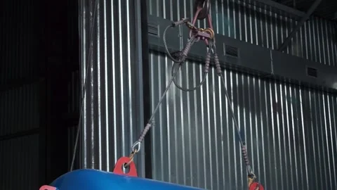 Moving the object of the barrel with a crane Stock Footage 259307085