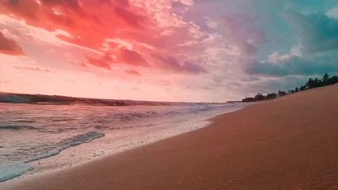 Moving ocean waves on sunset beach Stock Footage 113744332