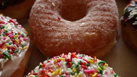 Moving over the top of a box of donuts 스톡 동영상 171504368