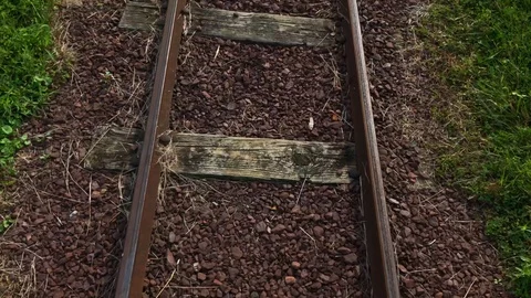 Moving over train tracks close overhead view Stockbeeldmateriaal 93671029