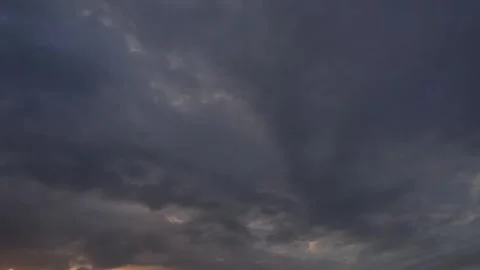 Moving overcast clouds on sky time lapse during sunset Stock Footage 243146900
