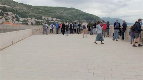 Moving pan of Old Town red tile houses, Dubrovnik City Wall, Croatia Video stock 283195150