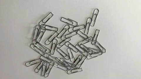 Moving paper clips Stock Footage 219496619