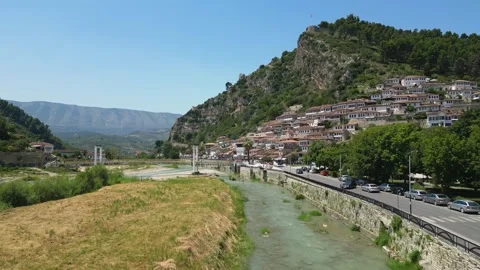 Moving parallel to the river in Berat Stock-Footage 286711448