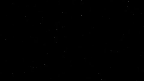 Moving particles on a black background | Stock Video | Pond5