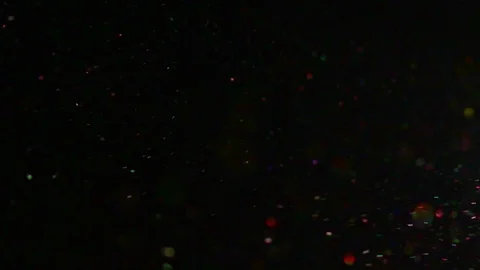 Moving particles blur on black backgroun... | Stock Video | Pond5