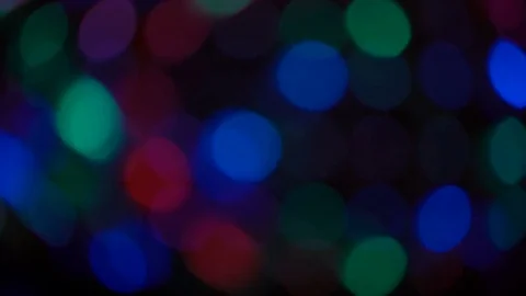 Moving particles. Colorful, blurred, bokeh lights background Stock Footage 71764235