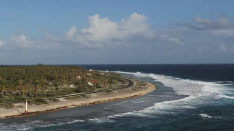 Moving past a reef in the Tuamotus Stock Footage 2974341