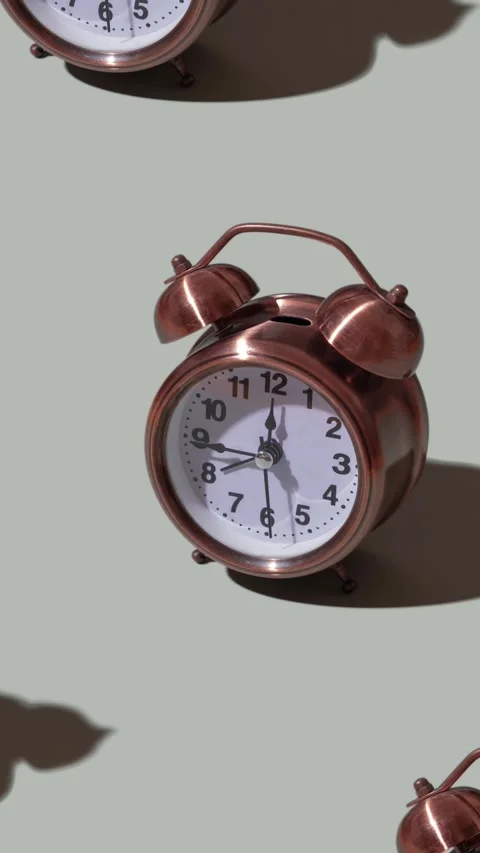 A moving pattern of an alarm clock on an grey background Stock Footage 238762708