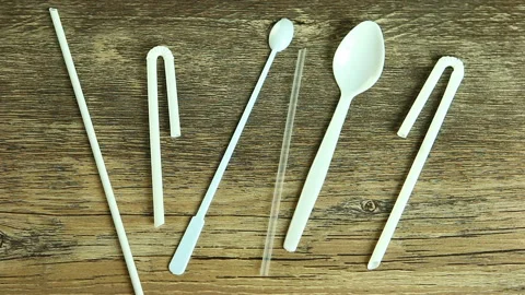 Moving  plastic  straw  spoon  and sticking  no plastic word on board Stock Footage 134032702