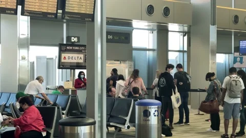Moving platform Delta Airlines gate New York City LGA at Raleigh Durham Airport Stock Footage 162319062