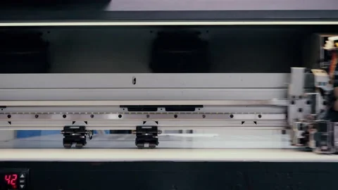 Moving print head of a large printing press. Stock Footage 130241509