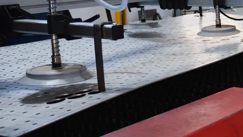 Moving the processed metal sheets at a metalworks workshop Video stock 126020941