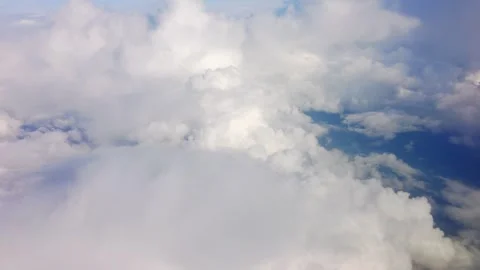 Moving puffy clouds, daytime 4K Stock Footage 255576644