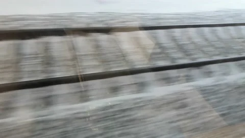 The moving rails outside the train window. Stock Footage 229717763