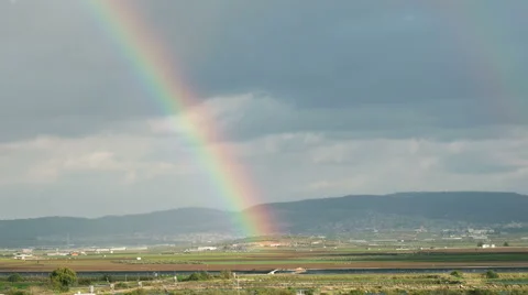 Moving Rainbow over the fields of Galilee, Israel with sun rays Vídeo Stock 45613521