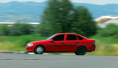 Moving red car Foto stock