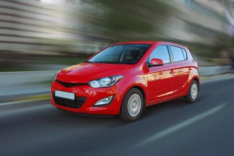 Moving red car Stockfoto's