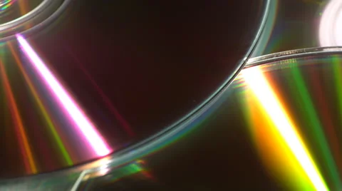 Moving reflections on CDs Stock Footage 62083563
