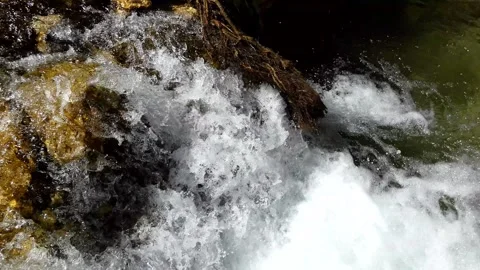 Moving river with small waterfall in the stones Stock Footage 263300952
