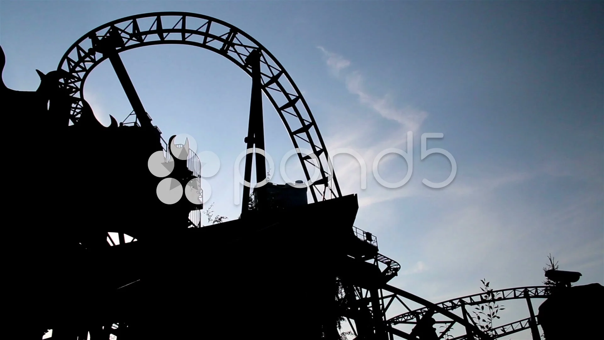 moving roller coaster ride view dark afternoon