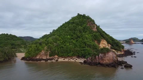 MOVING ROUND HILL NEXT TO BEACH Video stock 221303773