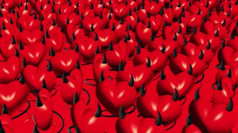 Moving rows of red devil hearts Stock Footage 134468773