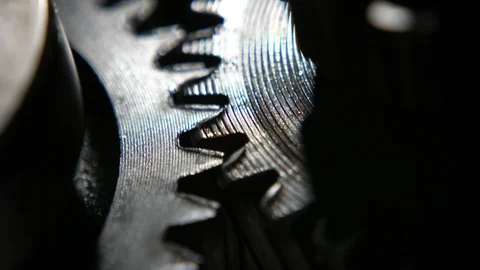 Moving scallops of two broad cogwheels working in a contemporary car gearbox Stock Footage 125076670