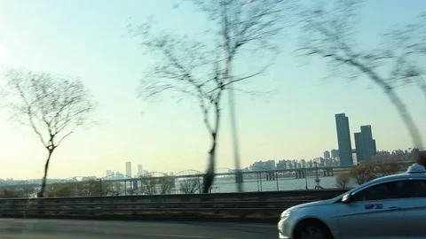 Moving scenery seen through the windows of a vehicle at Seoul Stock Footage 105507479