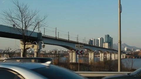 Moving scenery seen through the windows of a vehicle at Seoul, South Korea Stock Footage 105507606