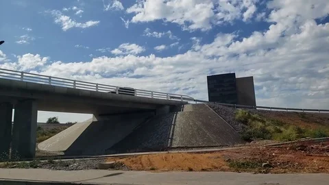 Moving scenery seen through the windows of a vehicle Stock Footage 105792884