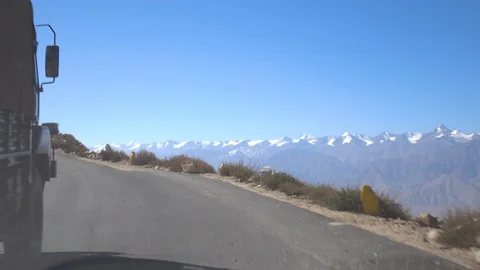 Moving scenery seen through the windows of a vehicle at Leh Ladakh, India Stock Footage 106107257