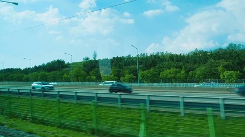 Moving scenery seen through the windows of a vehicle at Seoul, South Korea Stock Footage 120586325
