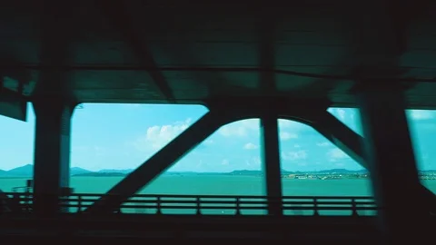 Moving scenery seen through the windows of a vehicle across the bridge at Seoul Stock Footage 125427960