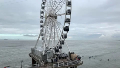 Moving Scheveningen Ferris Wheel  (The Pier SkyView) at the Den Haag beach. Stock Footage 145230360