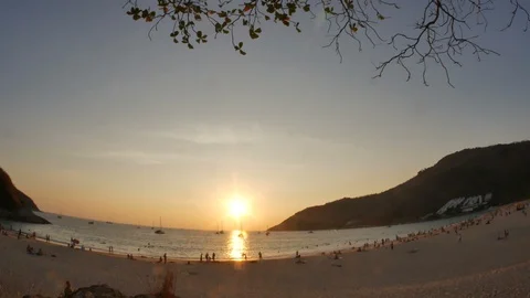 Moving sea wave breaking sand coast, yacht boat parking in ocean, beam of sun Stock Footage 128067331