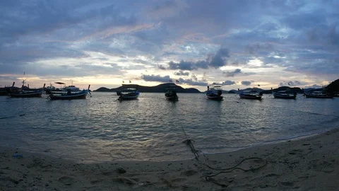 Moving sea wave water at sandy beach and moving thai flag on long tail boat t Stock-Footage 101404110