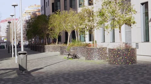 Moving shadow over a modern urban city plaza Stock Footage 329592829