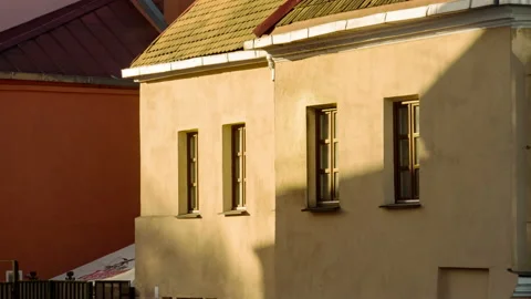 Moving shadows on the facade of an old house Stock Footage 155088224