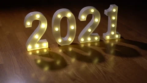 Moving shadows of illuminated numbers 2021 Stock Footage 140730435