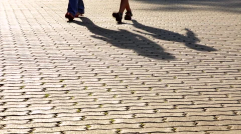Moving shadows of walking mother and her child legs. 스톡 동영상 44774660