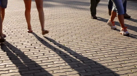 Moving shadows of walking people legs and baby stroller. 스톡 동영상 44774915